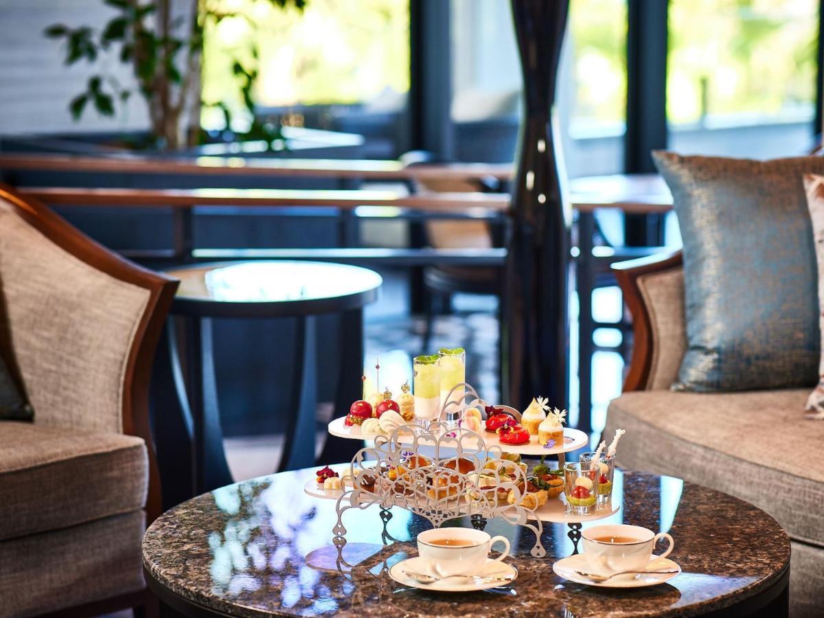 Ryukyu Hotel & Resort Nashiro Beach Itoman Extérieur photo Afternoon tea at the hotel